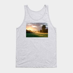 Foggy grassland and trees at sunrise Tank Top